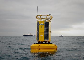 Yellow E1 data buoy at sea