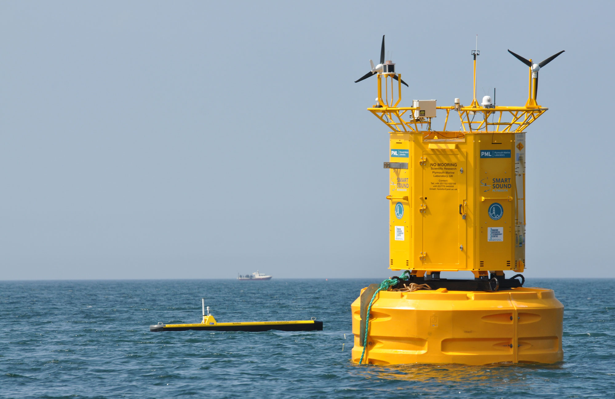 Scientific buoy in Plymouth Sound with PML pioneer